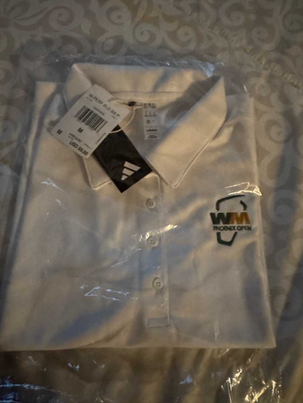 adidas women’s White Polo with WM Phoenix Open Logo short sleeves